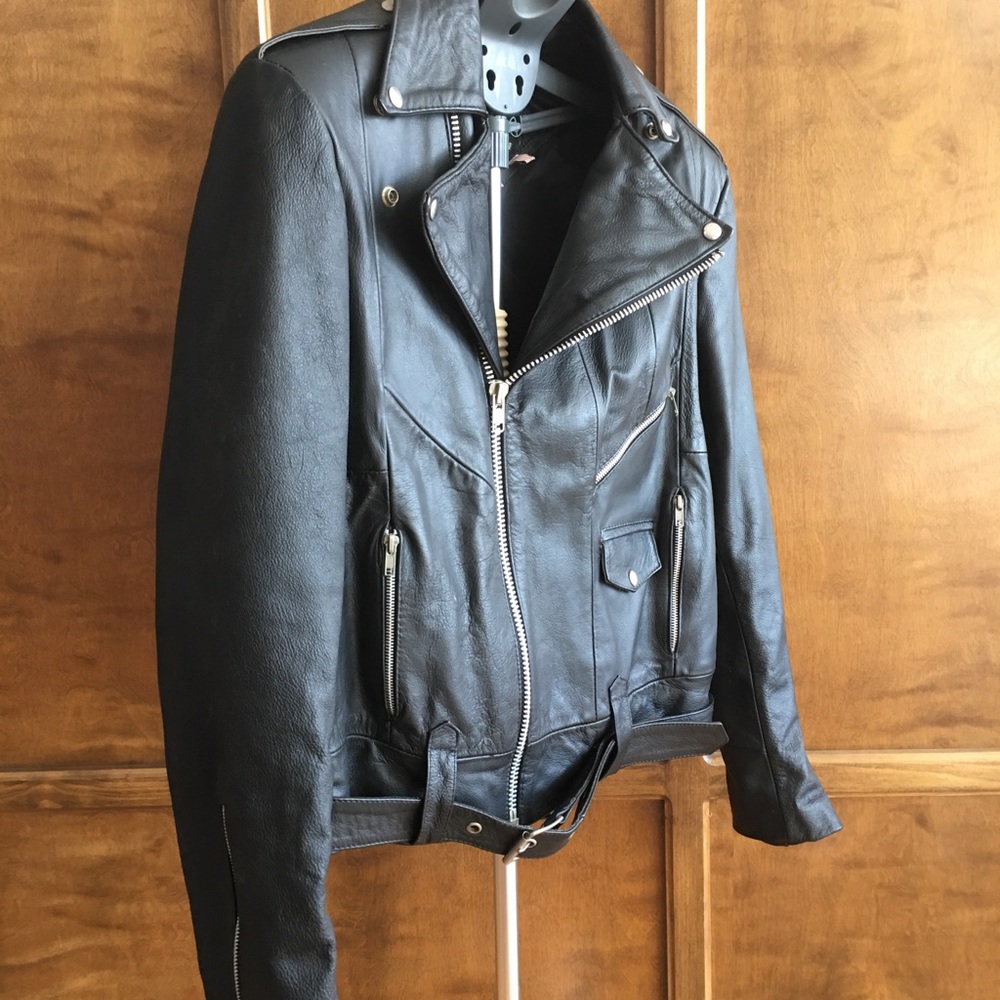 James Dean , Marlon Brando, type motorcycle jacket leather.